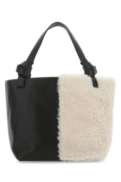 Two-tone leather and shearling handbag