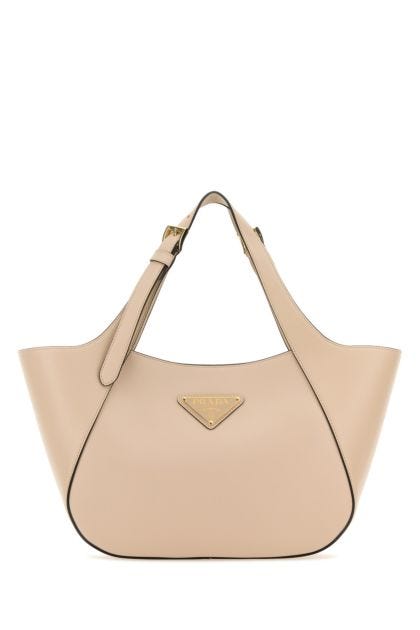 Light pink leather handbag